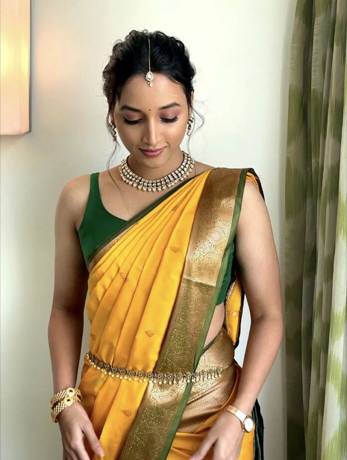 Srinidhi Shetty Looks Effortlessly Beautiful In A Yellow Silk Saree