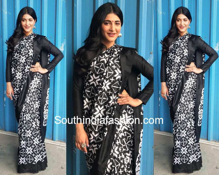 sruthi haasan black ikat saree madhu jain