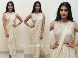 pooja hegde white dhoti saree at valmiki pre relesae event