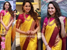 pragya jaiswal in yellow kanjeevaram saree at hiya jewellery showroom launch tirupathi