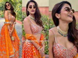 pooja hegde in orange lehenga at a wedding