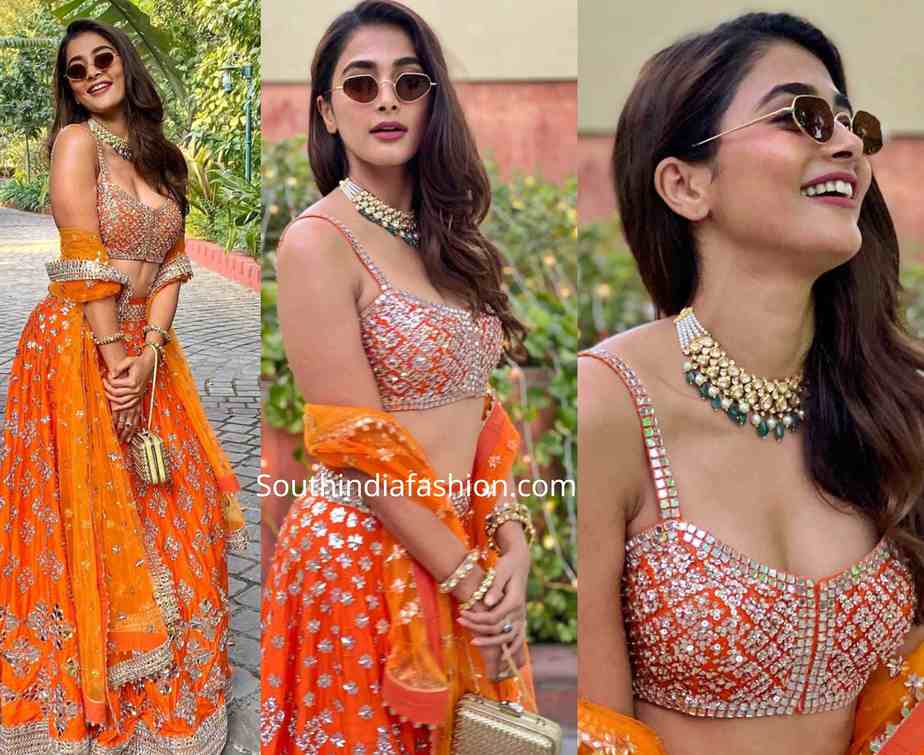 pooja hegde in orange lehenga at a wedding