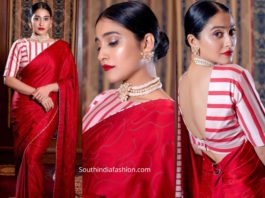 regina cassandra in red saree and striped blouse at a wedding reception in chennai