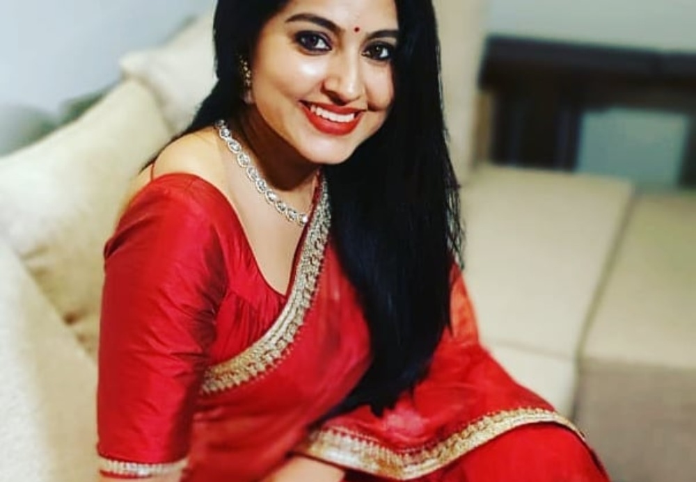 Sneha Prasanna in red organza saree