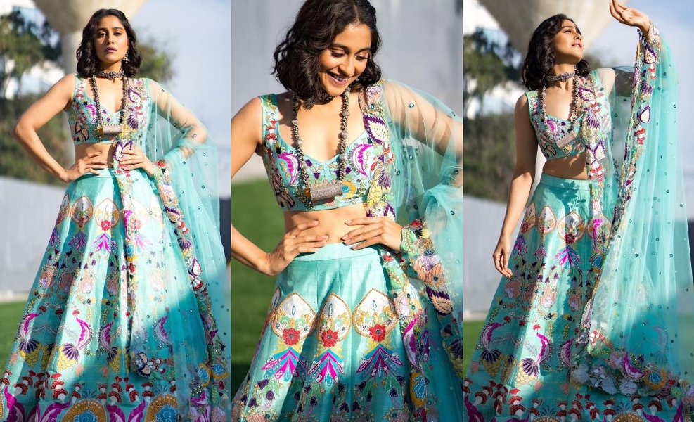 Regina Cassandra in a blue lehenga by Aisha Rao