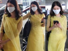 divya khosla kumar wearing a yellow outfit at airport