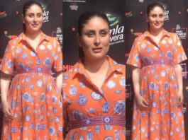 Kareena Kapoor Khan in a maternity orange printed maxi dress