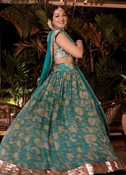 Catherine Tresa twirls away happily in a gorgeous Mrunalini Rao lehenga!