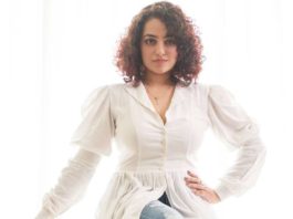 Nithya Menen in white top and ripped jeans