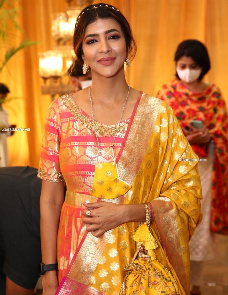 lakshmi manchu in a long anarkali with yellow mask