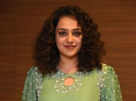 nithya menen in a long green kurta