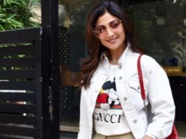 shilpa shetty in white gucci top and beige jeans