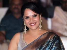 anasuya bharadwaj at chaavu kabaru challaga prerelease in blue saree