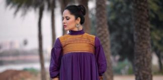 anasuya bharadwaj in full ruffle dress in purple