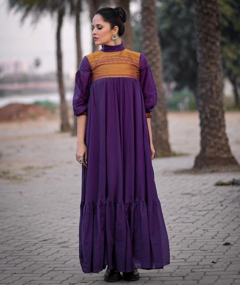 anasuya bharadwaj in full ruffle dress in purple