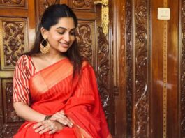 Nakshathra Nagesh in a red saree by Suviha collections