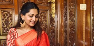 Nakshathra Nagesh in a red saree by Suviha collections