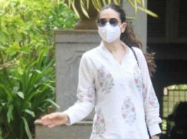 karishma kapoor in white kurta pant set