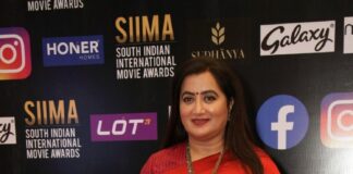 Sumalatha Ambareesh in a multi coloured saree for SIIMA-2021