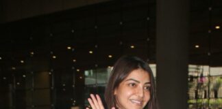 Kajal aggarwal in a white dress at the airport