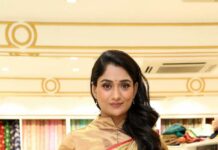 Sandhya Raju in a gold saree at a shop opening-