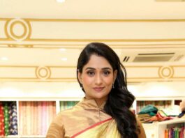 Sandhya Raju in a gold saree at a shop opening-