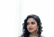 Amala Paul in a sorbet pink pre draped saree by Nikita Vishakha for brother's wedding0