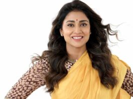 Shriya Saran in a mustard yellow saree dress by Anand Kabra for gamanam promotions-1