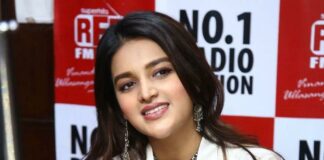 Nidhhi Agerwal; in a white skirt set by Madder much-1