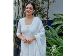 Nithya Menen in a white anarkali by Rehana Basheer