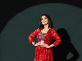 Madhuri dixit in a red label anushree cape set for fame game promotions-2