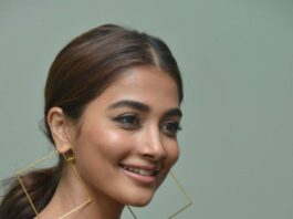 Pooja Hegde in a green knit skirt set by Self potrait for Radhe Shyam interview-2