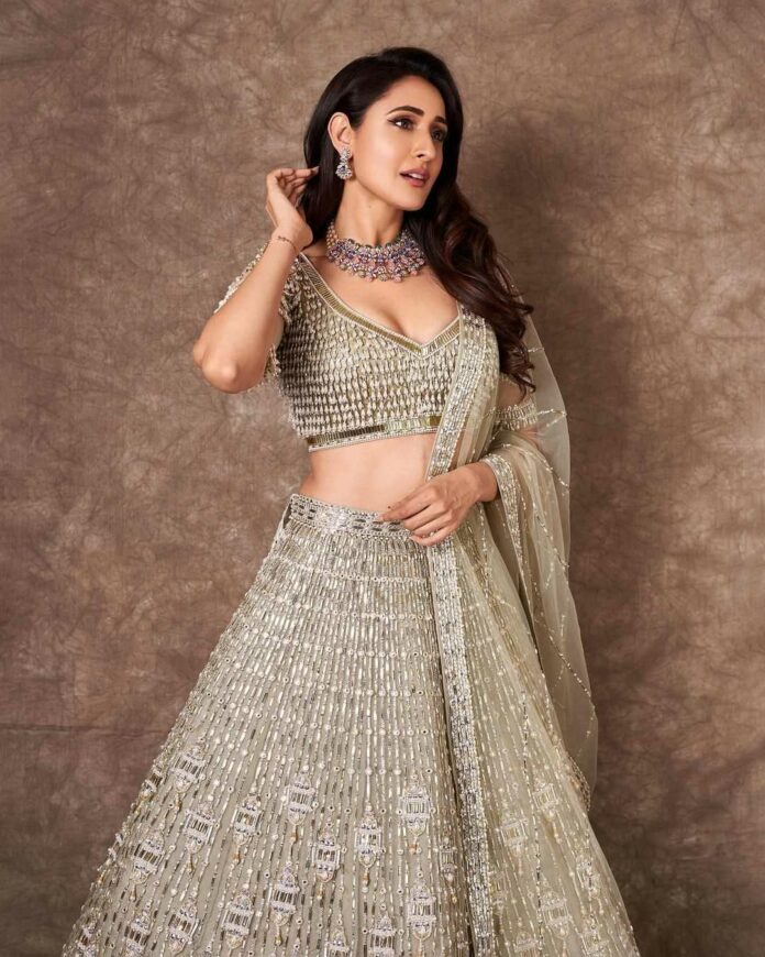 Pragya Jaiswal sparkles in an ivory lehenga set for an event!