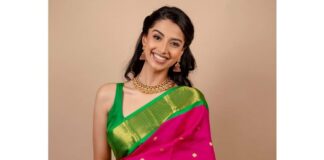 Meenakshi Chaudhary in a pink kanchipuram saree by Aarya Nair