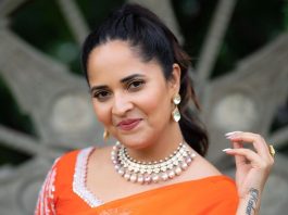 anasuya bharadwaj in an orange pre draped saree by kowshiki1