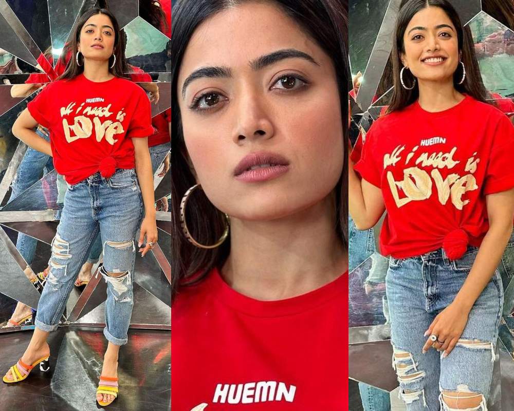 Rashmika Mandanna's street style fashion in a red T-shirt-distressed denim!