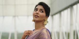 aishwarya lekshmi in a yellow silk saree by milange for kumari trailer launch1