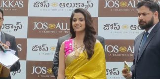 keerthy suresh in a yellow saree at jos alukkas in vizag