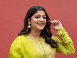 aparna balamurali in a neon green anarkali by weaver story for nitham oru vanam promotions1